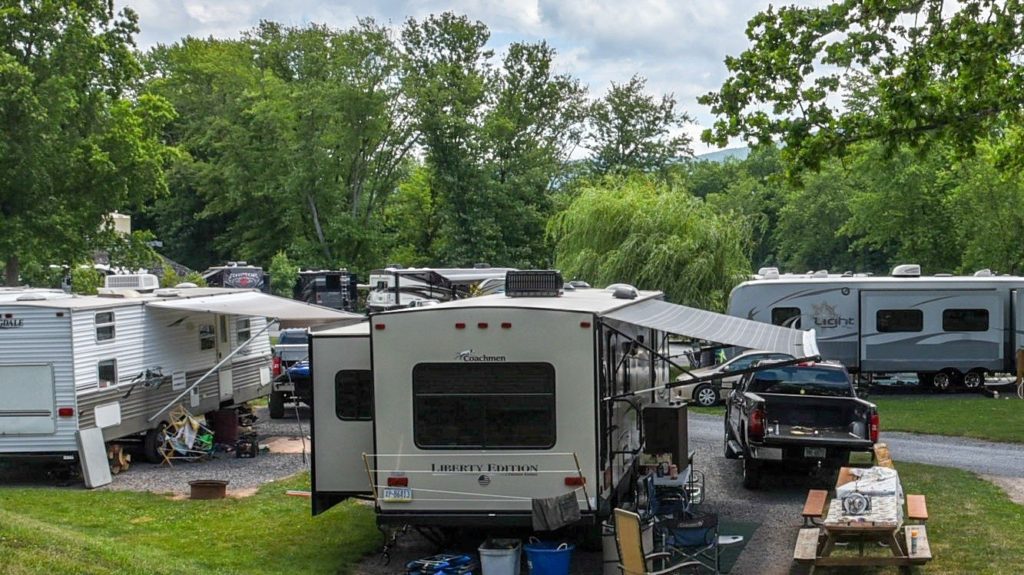 Residential Vehicles parked in a campground on a sunny day