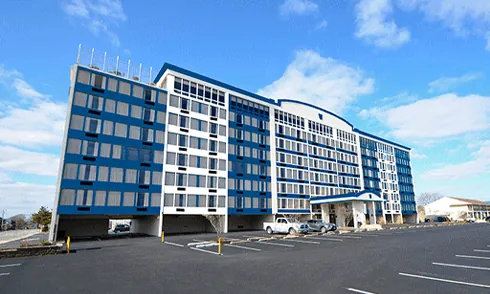 Exterior of the Fenwick Inn on a sunny day